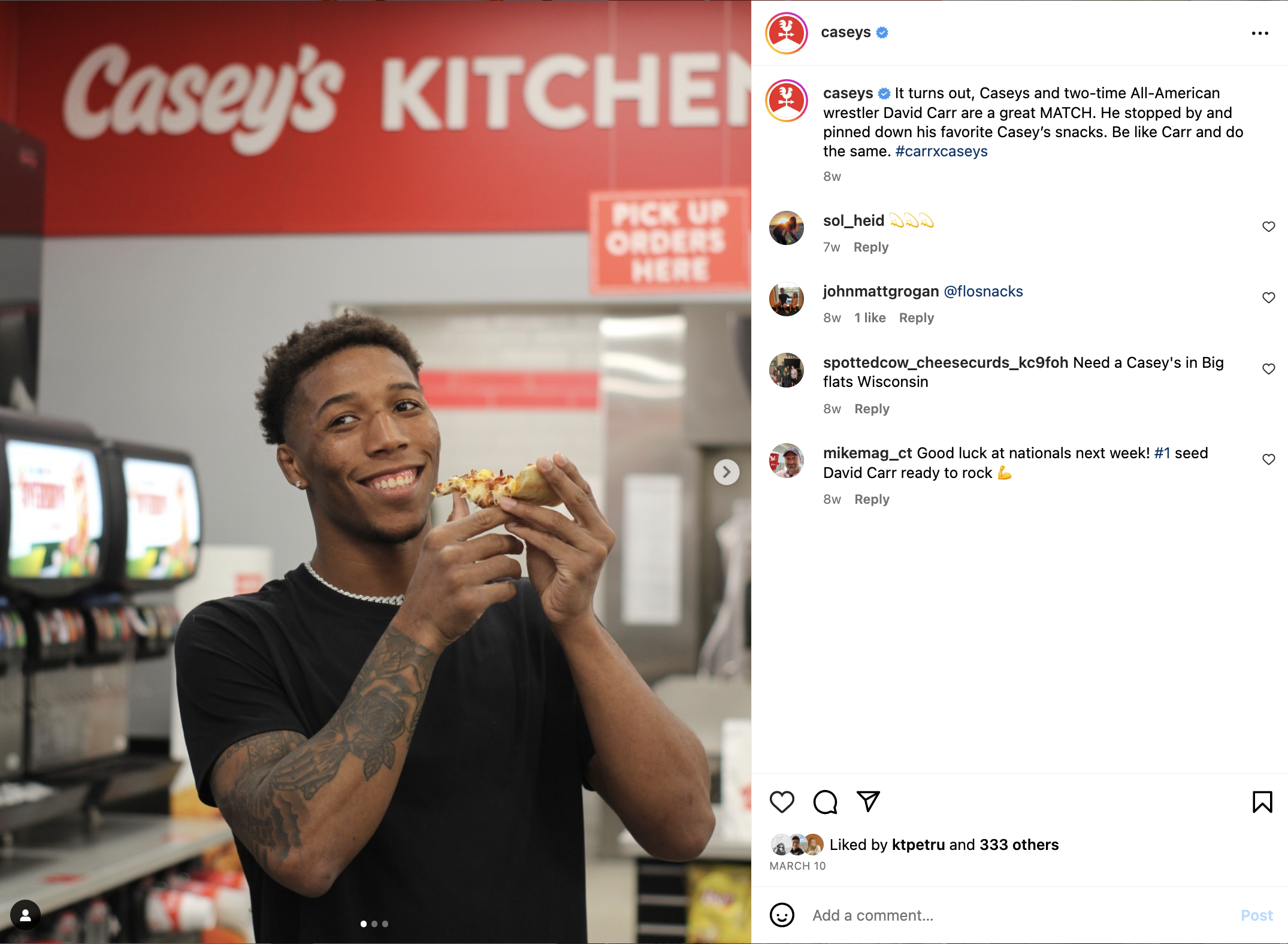 Casey's Instagram post featuring wrestler David Carr eating a slice of pizza