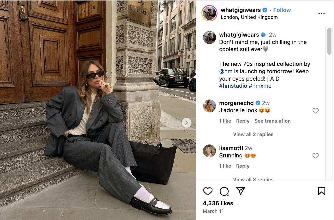 A sponsored Instagram post from Agnes Pusztai. She's wearing an oversize suit with loafers from H&M.